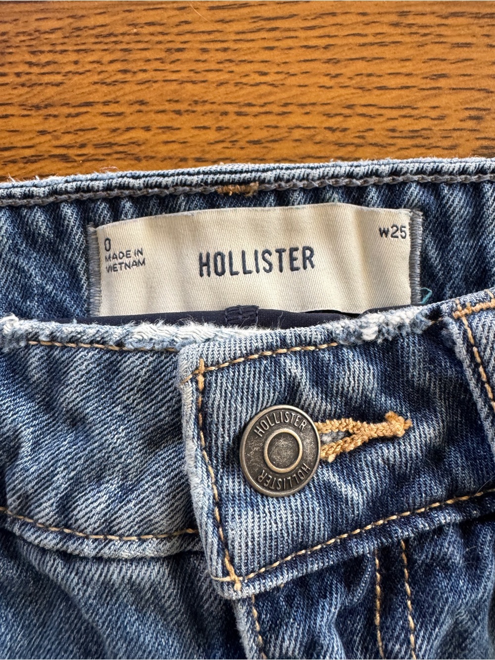 Hollister Blue Denim Mini Skirt with Pink Bow Accents and Built-In Shorts - Picture 2 of 6